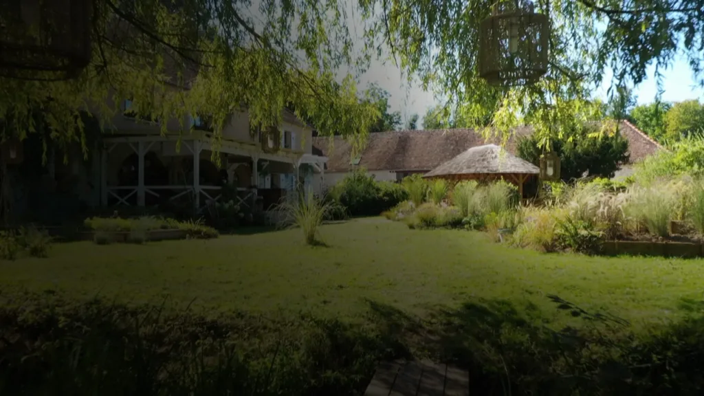 La maison d’Un dimanche à la campagne, sa véranda et son jardin